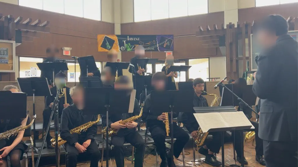 Jazz band performing at the Irvine Jazz Festival; other faces blurred