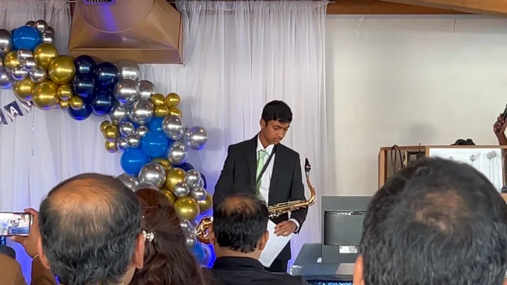 Aditya performing a tenor saxophone solo